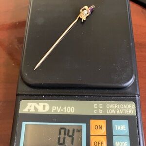 Gold and Purple Brooch with Delicate Charm